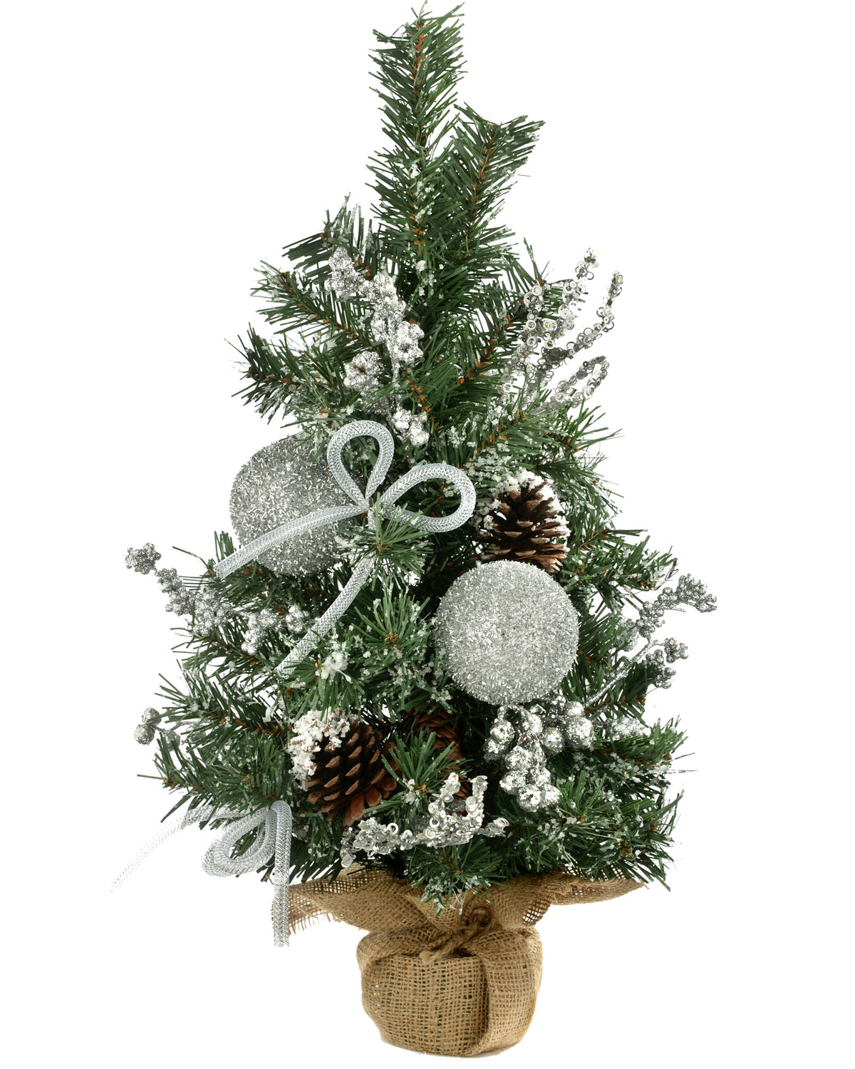 A 2-foot pre-decorated artificial Christmas tree with snow-flocked green branches, red berries, pinecones, baubles, and flowing ribbons, set in a rustic hessian-wrapped base.