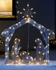 A contemporary 2D Mesh Nativity Set featuring silhouettes of Mary, Joseph, and Baby Jesus with LED lights, suitable for indoor or outdoor use.