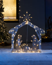 A contemporary 2D Mesh Nativity Set featuring silhouettes of Mary, Joseph, and Baby Jesus with LED lights, suitable for indoor or outdoor use.