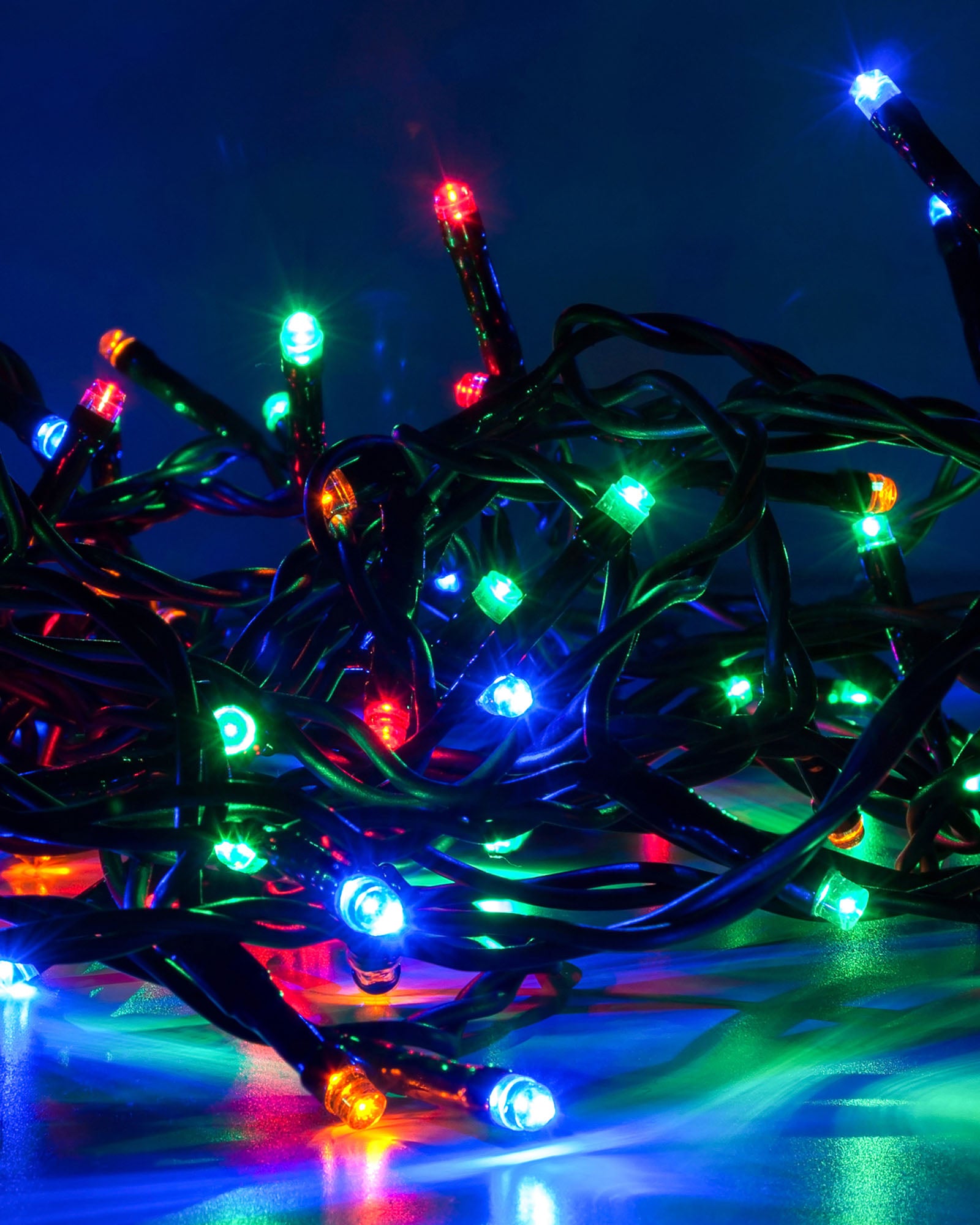 Close-up of a 200 LED multi-coloured light string showing red, green, blue and amber bulbs