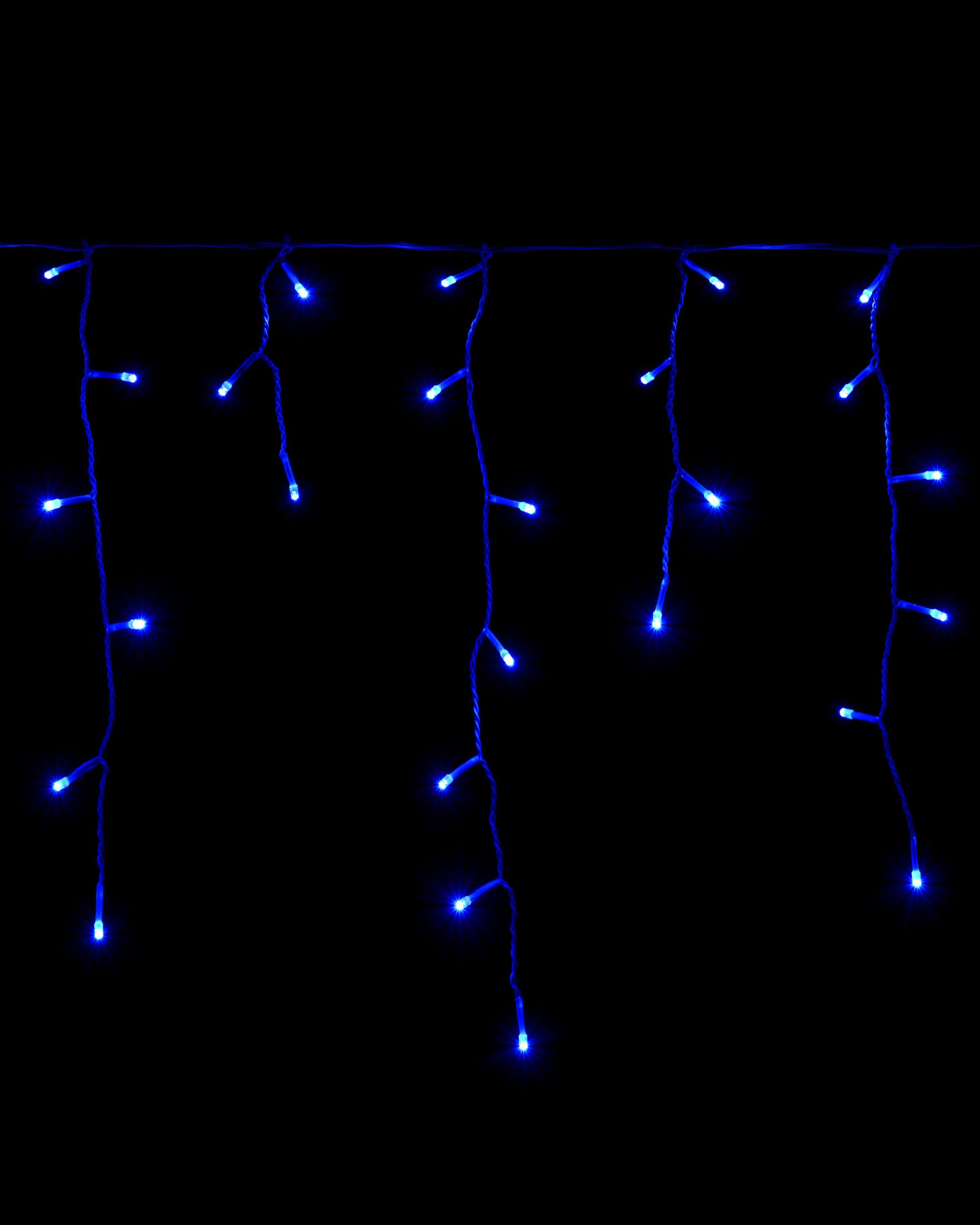 Blue LED icicle lights hanging against a black background