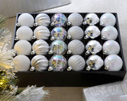 Set of 48 silver and white 6cm shatterproof baubles arranged in a storage box