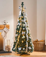 Pre-lit 6 ft decorated Holly Pop-Up Christmas tree with 150 warm white LEDs, champagne and silver baubles, poinsettias, and ribbons—easy setup, elegant festive centerpiece in a living room.
