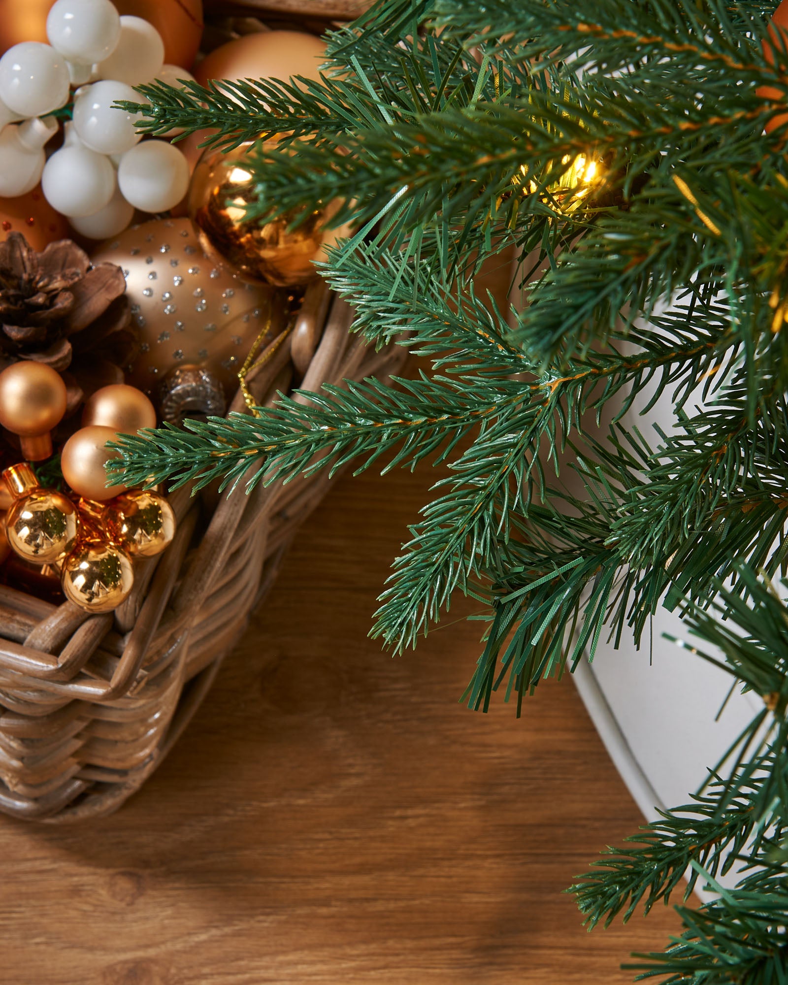 Pre-lit pop-up Christmas tree with 490 mixed PE and PVC tips, 100 warm white LED lights, 60 white, silver, and gold baubles, built-in memory controller with 8 lighting functions, and foldable metal stand—pre-decorated for easy assembly and timeless festive elegance in a decorated indoor setting.